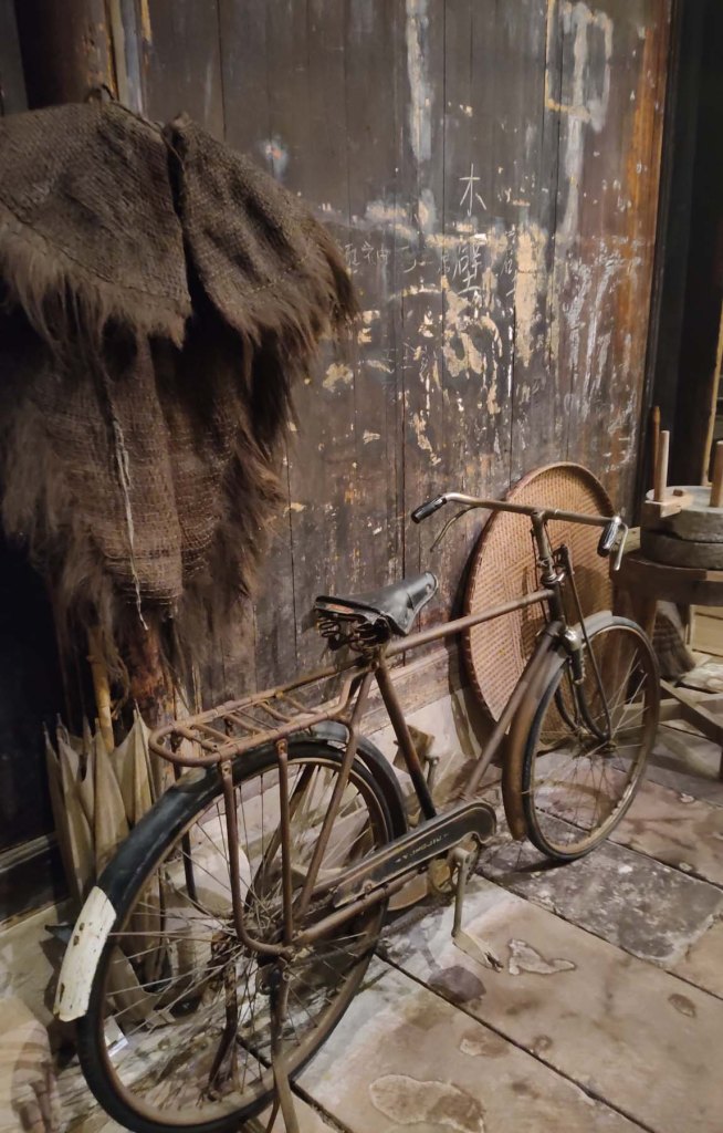 Raincoat, Bike and Grinder