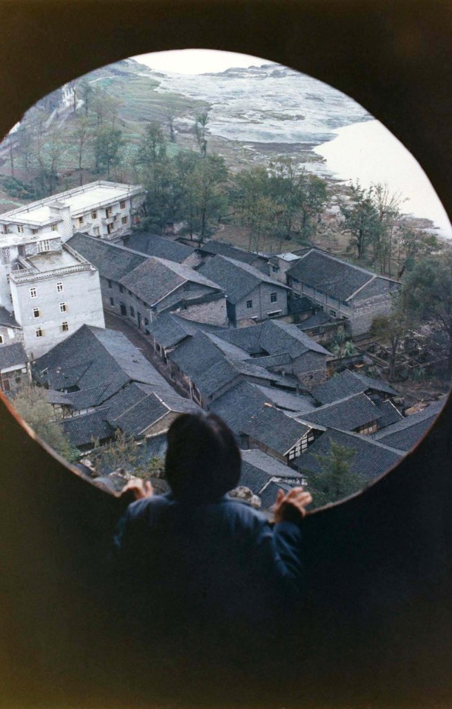 Woman Standing at Window in the Red Pagoda by Yangtze River